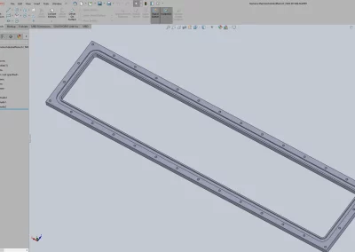 A side-by-side comparison of a 2D blueprint and its 3D counterpart, created with SolidWorks CAD software